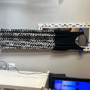 Size 8 Maxi dress.  Flowy on top and fitted on bottom